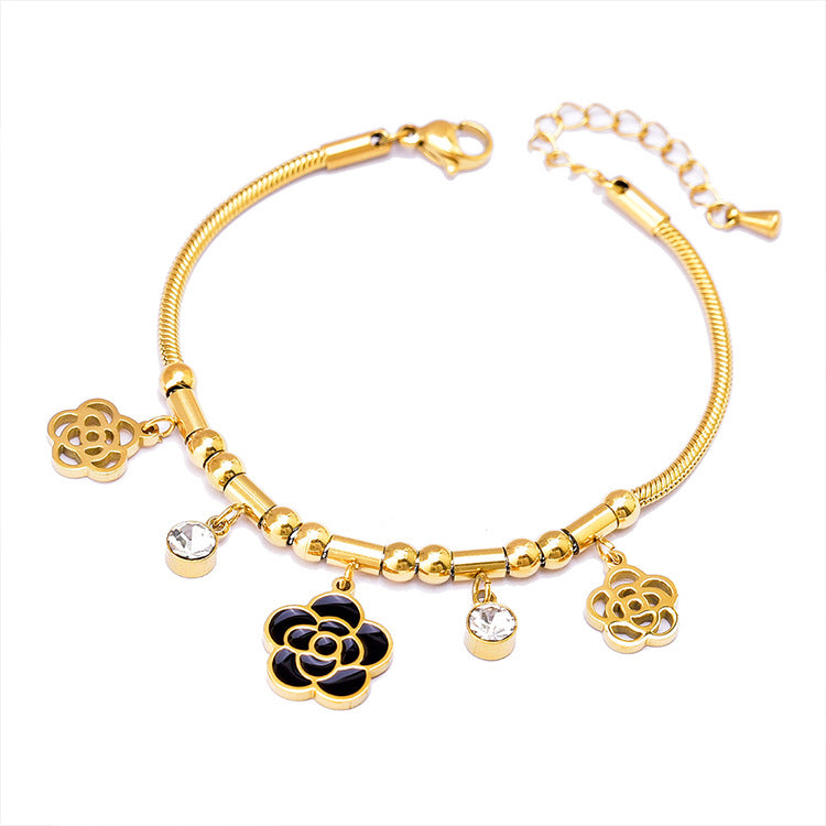 Pulsera de Hueso de Serpiente Geométrica Colorida con Oso y Dijes