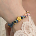 Pulsera Tejida a Mano de Cuentas de la Suerte para Novias