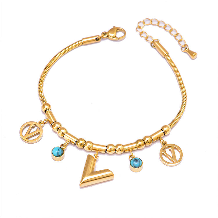 Pulsera de Hueso de Serpiente Geométrica Colorida con Oso y Dijes