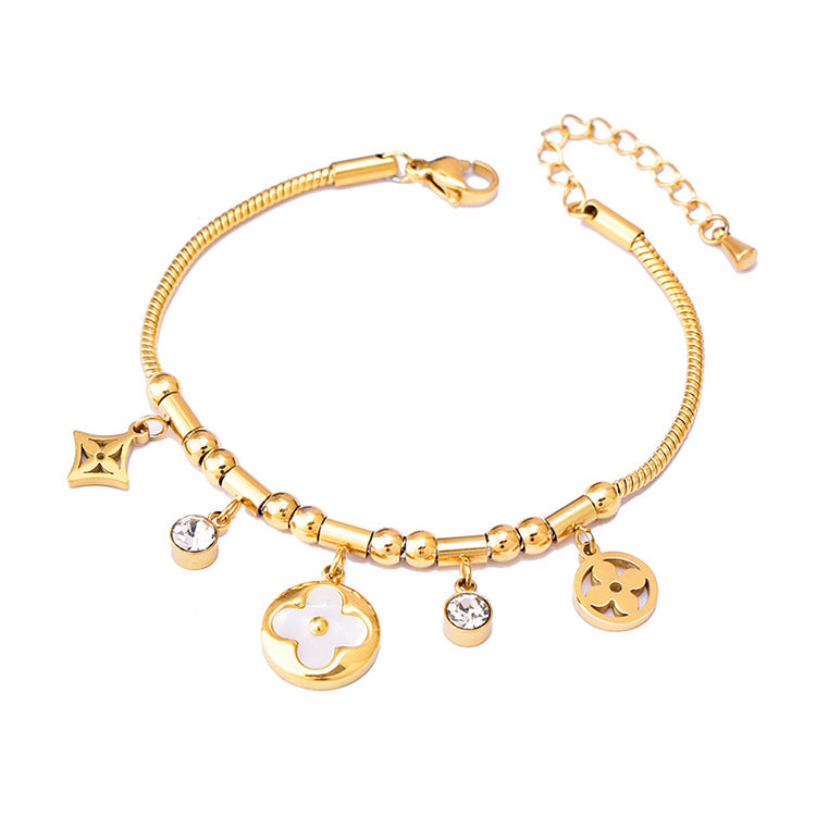 Pulsera de Hueso de Serpiente Geométrica Colorida con Oso y Dijes